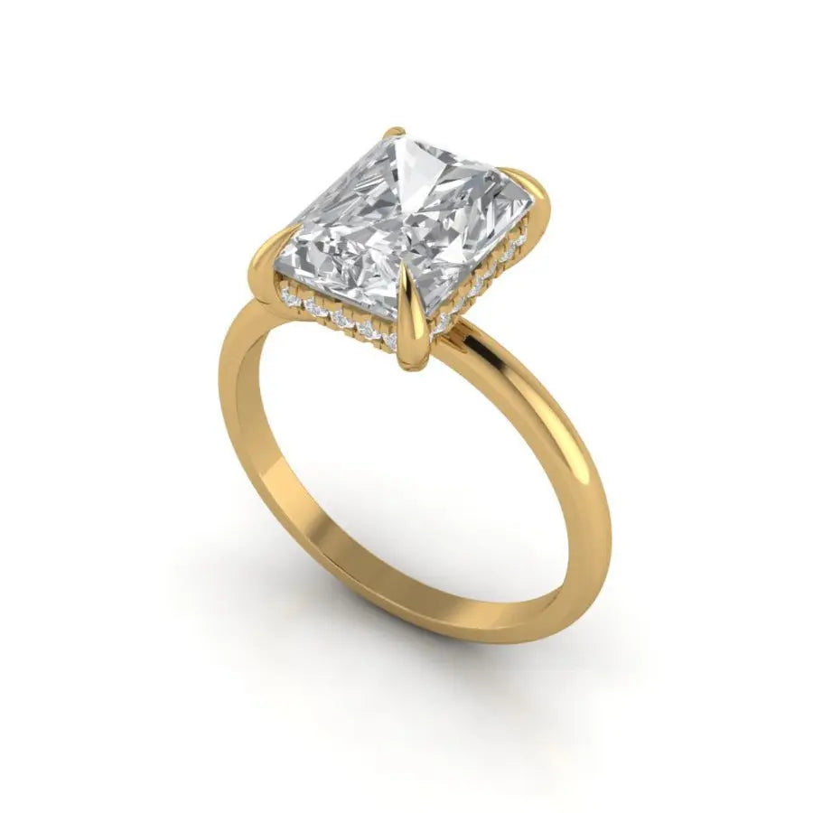 Gold ring with a diamond on a white background