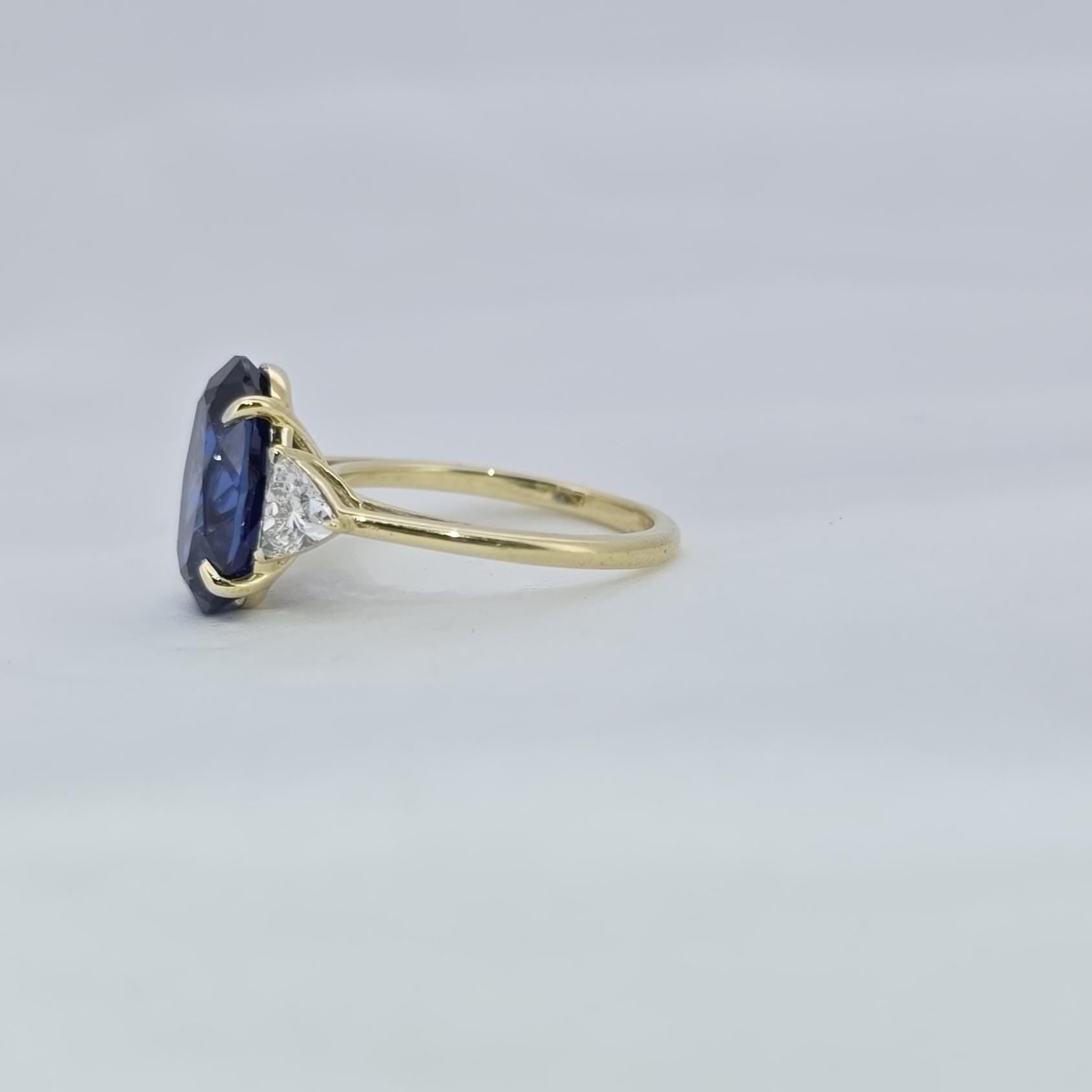 Oval Blue Diamond, Sapphire Hidden Halo Engagement Ring