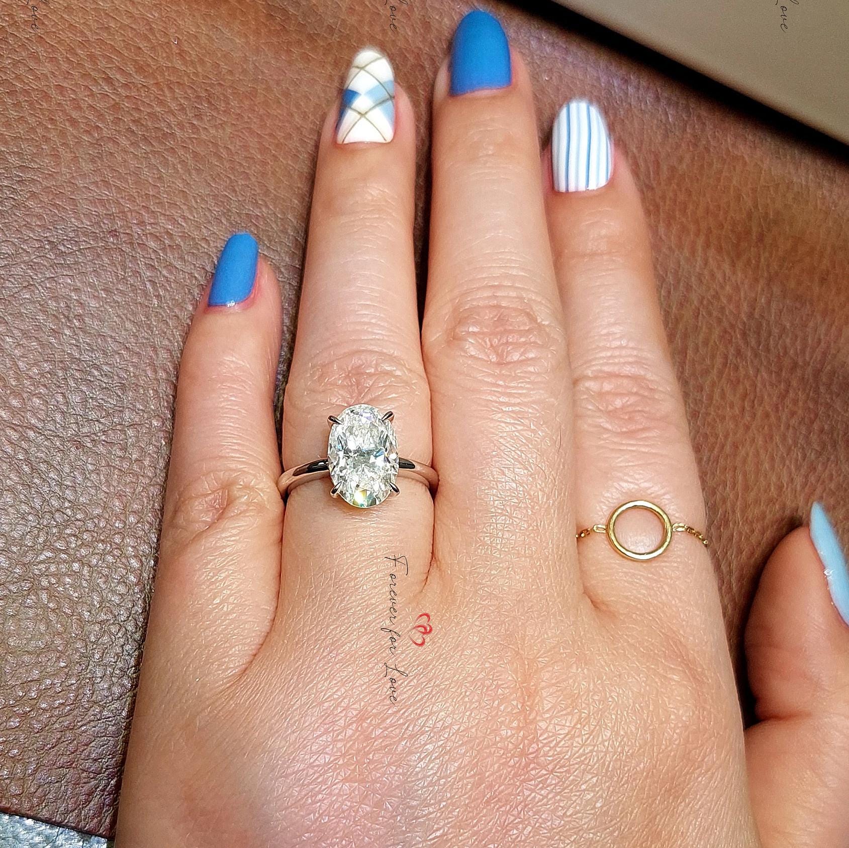 Oval Moissanite Halo Engagement Ring