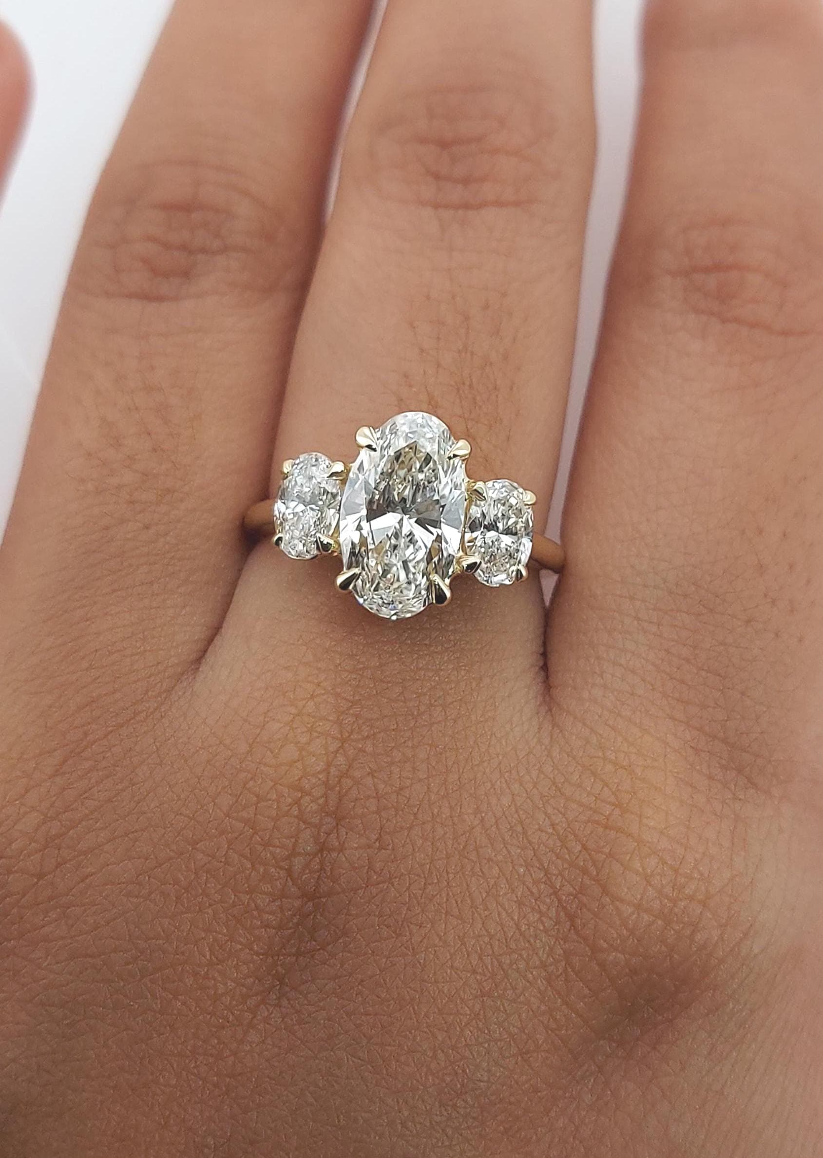 2 Ct IGI Certified Oval Gemstone Three Stone Engagement Ring
