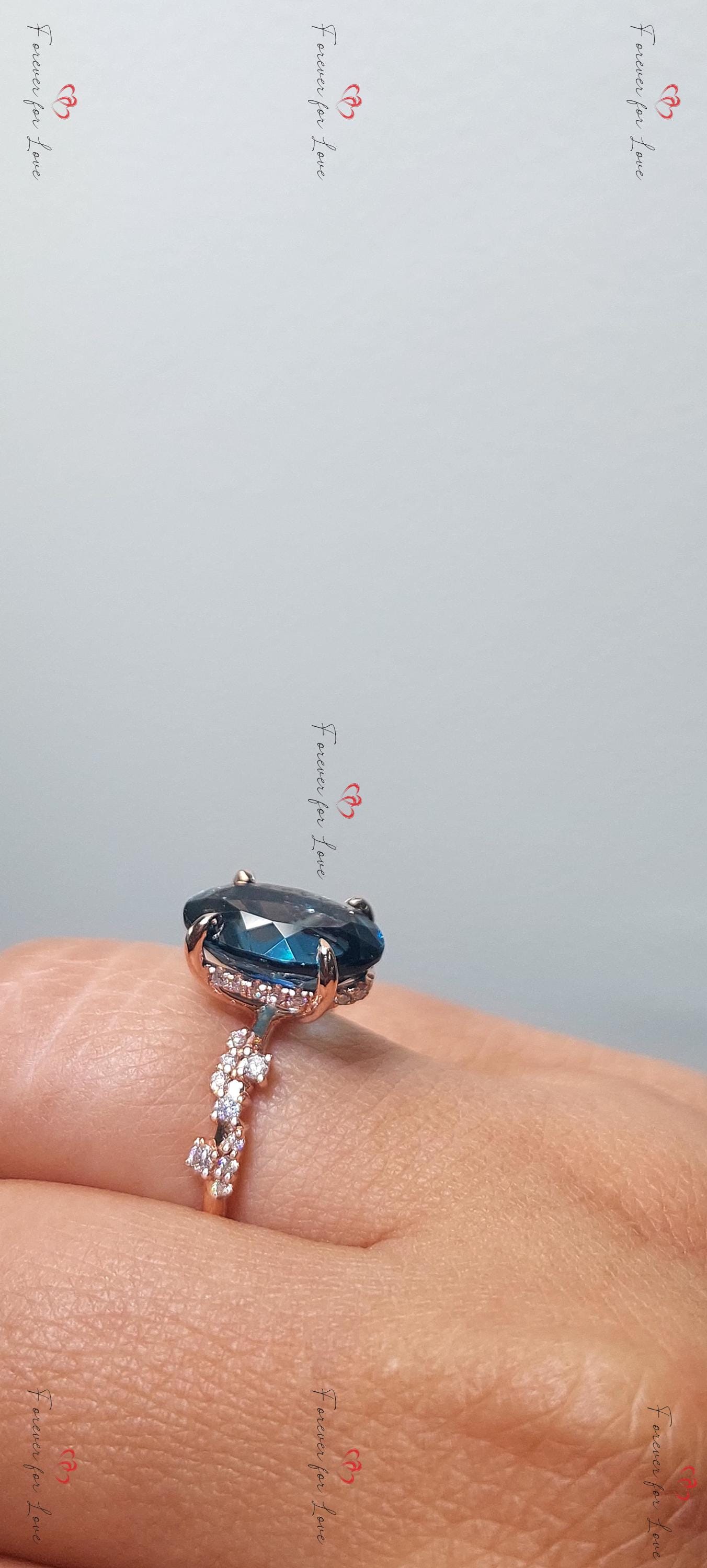 Oval Blue Diamond, Topaz Solitaire Ring Oval cut Moissanite engagement ring in Gold or Platinum — custom handcrafted by Forever For Love