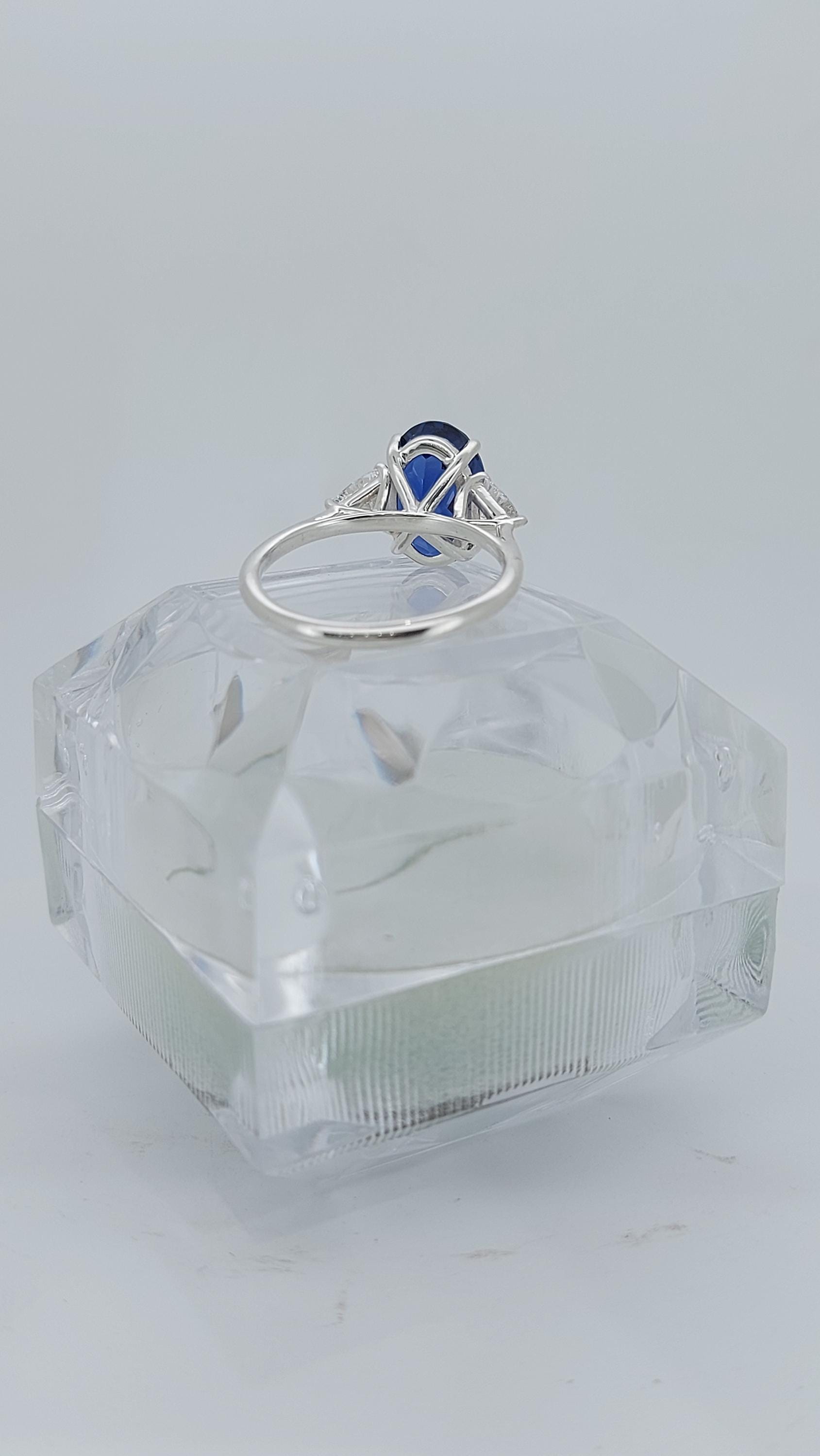 Oval Blue Diamond, Sapphire Halo Engagement Ring