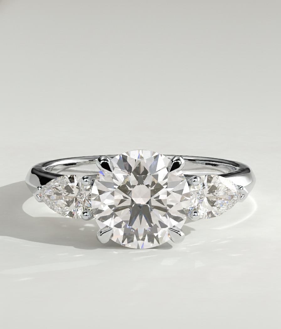 4.5 Ct Pear Lab Diamond Three Stone Engagement Ring
