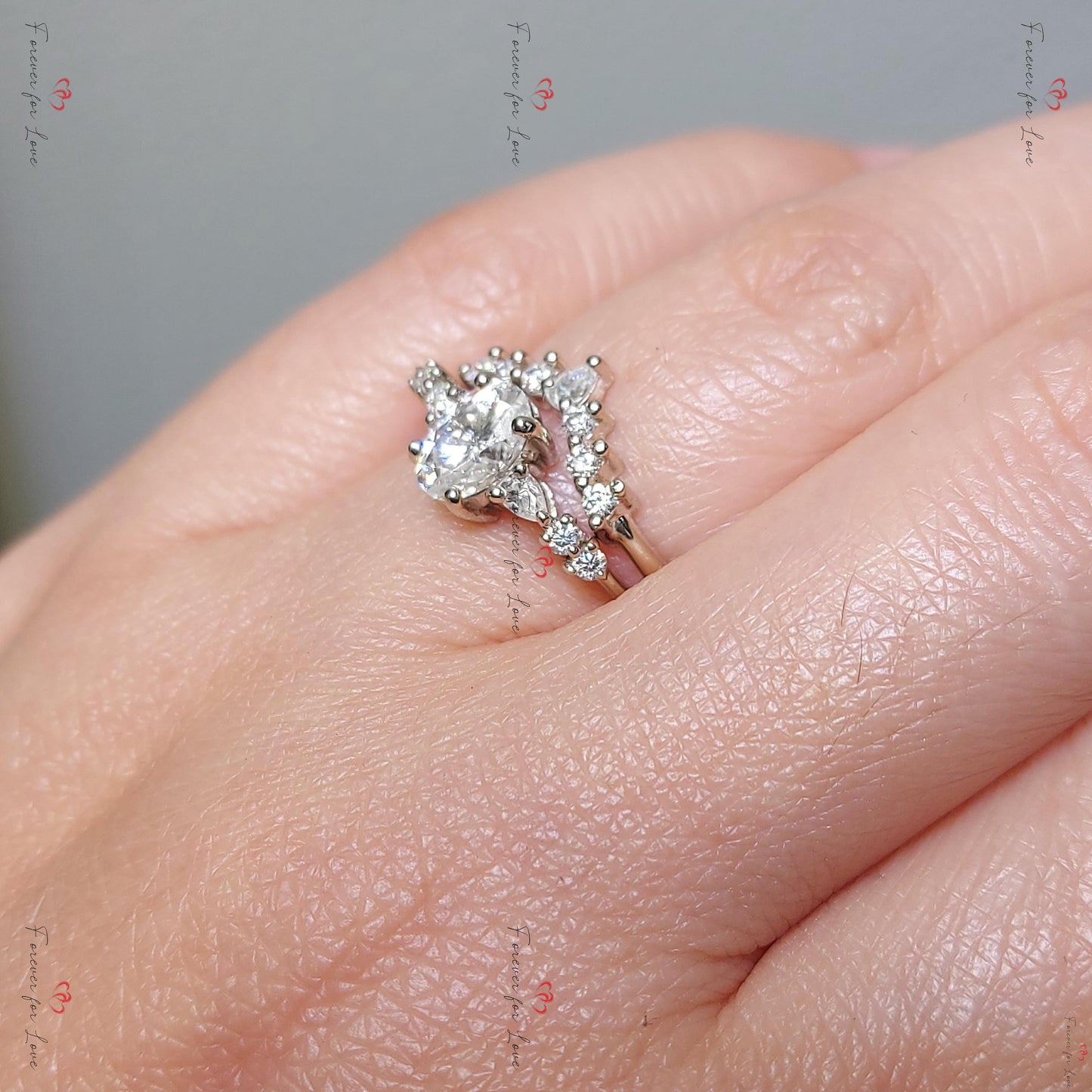 Parure de mariage délicate en moissanite ovale avec bague empilable Oval cut Moissanite taille brillant engagement ring in Gold or Platinum — custom handcrafted by Forever For Love