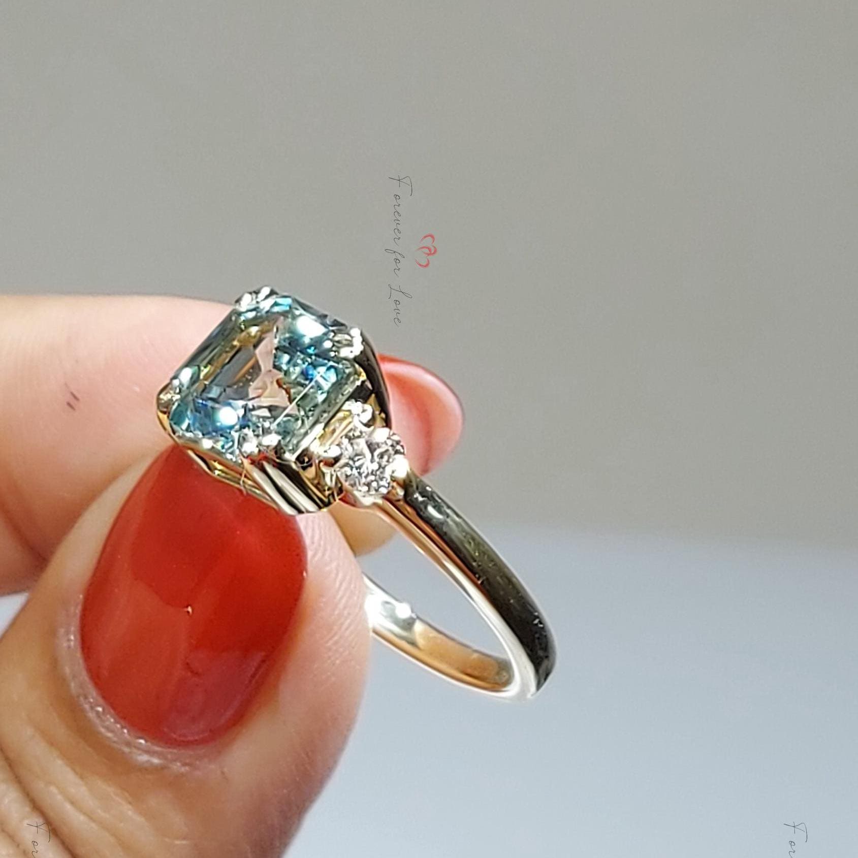 Green Sapphire Three Stone Engagement Ring