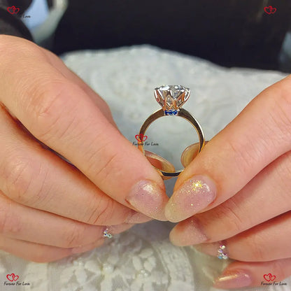 Round Cut Moissanite Engagement Ring in Yellow Gold