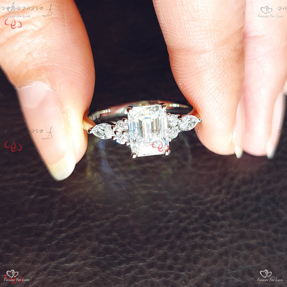 Emerald Cut Diamond Trilogy Engagement Ring with Marquise Side Diamonds