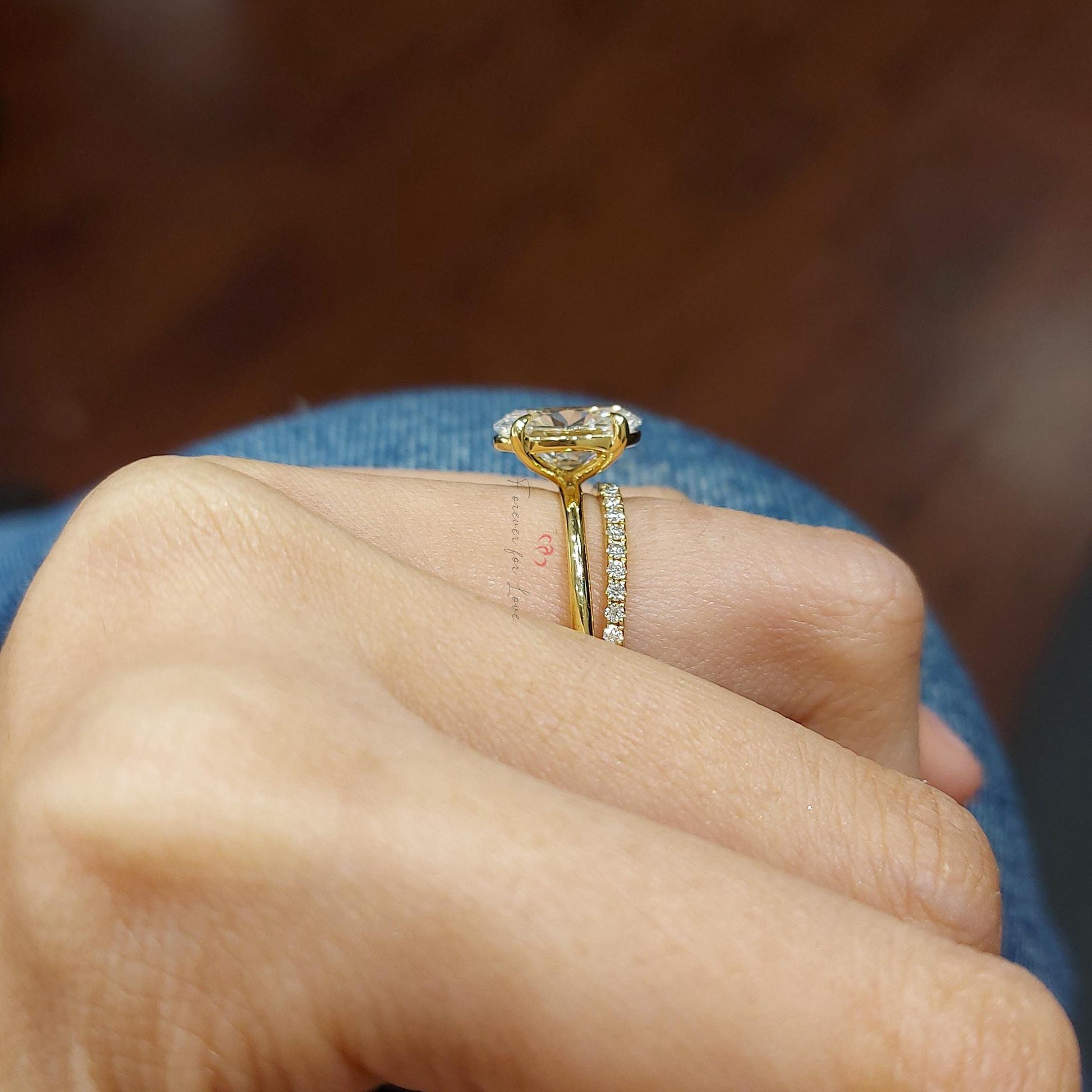 2.2 Carat Oval Cut Lab Grown Diamond Solitaire Engagement Ring & Matching Round Diamond Wedding Band, IGI Certified D/VVS2, 14K Yellow Gold.