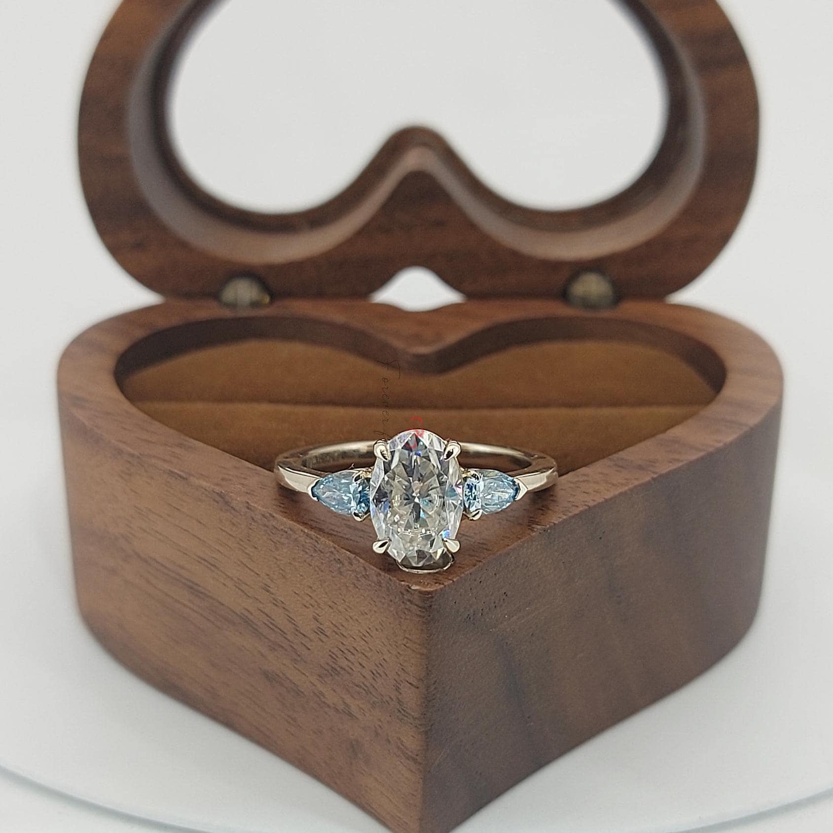 1.5 Ct Oval Diamond Three Stone Engagement Ring
