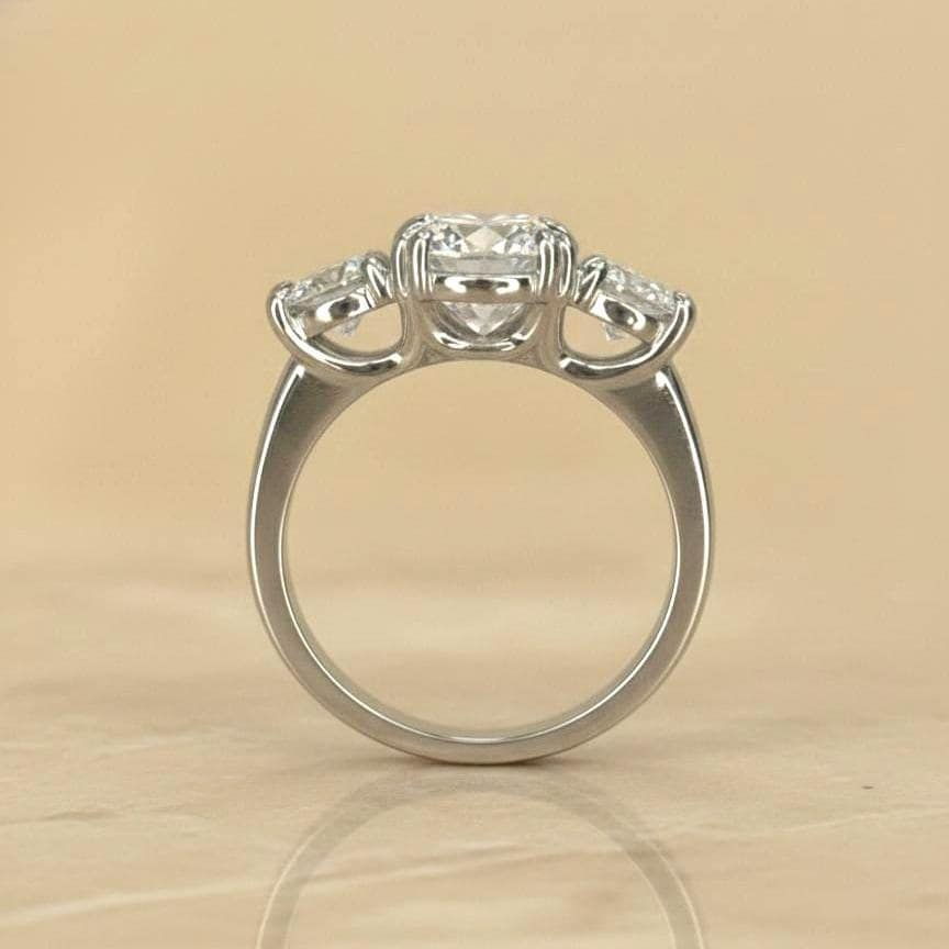 Bague de Fiançailles Trilogy en Diamant de Laboratoire Certifié IGI de 3 Carats Round cut Moissanite engagement ring in Gold or Platinum — custom handcrafted by Forever For Love