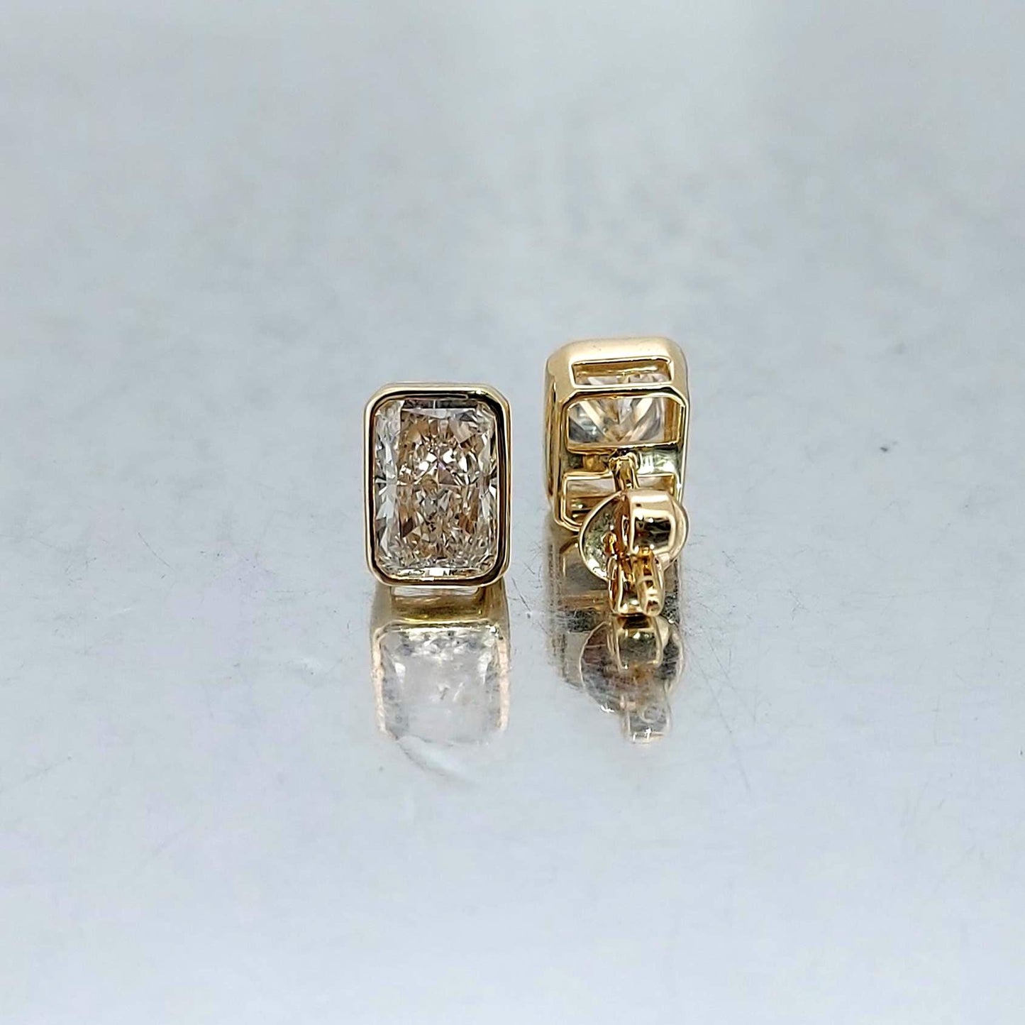 4 Carat Radiant Cut Bezel Setting Lab Grown Diamond Stud Earrings: 14K Yellow Gold, Perfect Gift for Her. 0.5 Carat Moissanite engagement ring in Gold or Platinum — custom handcrafted by Forever For Love