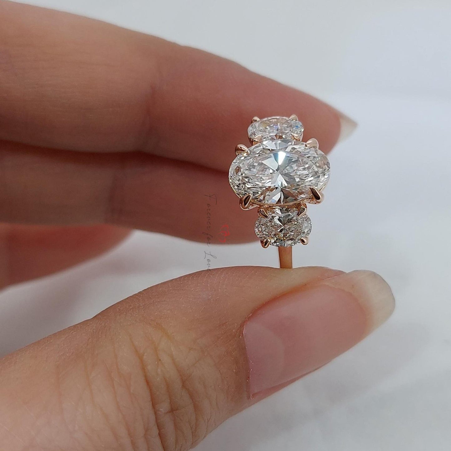 2.5 Karat Ovaler Labor-Diamant Dreistein-Verlobungsring Oval cut Moissanite engagement ring in Gold or Platinum — custom handcrafted by Forever For Love