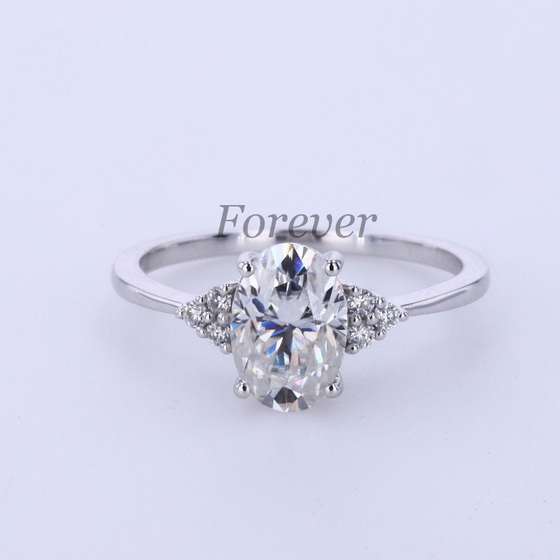 1.2 Ct Oval Moissanite Vintage Trilogy Engagement Ring Oval cut Moissanite engagement ring in Gold or Platinum — custom handcrafted by Forever For Love