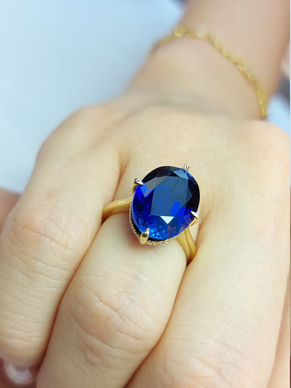 Oval Blue Diamond, Sapphire Hidden Halo Engagement Ring