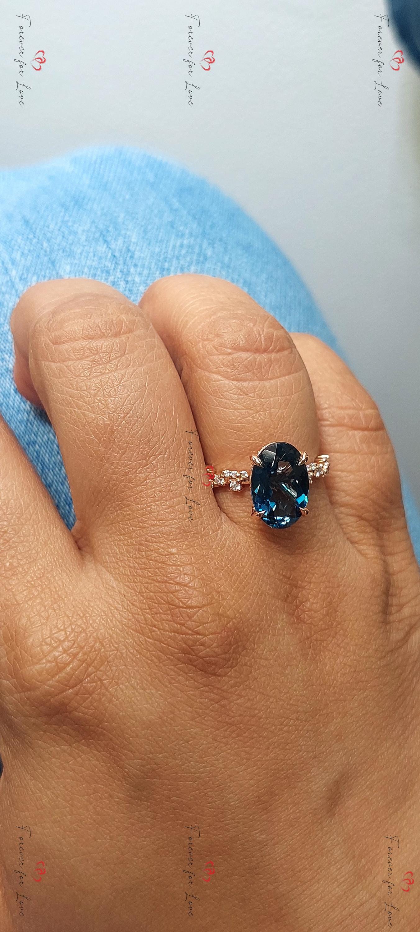 Oval Blue Diamond, Topaz Solitaire Ring Oval cut Moissanite engagement ring in Gold or Platinum — custom handcrafted by Forever For Love