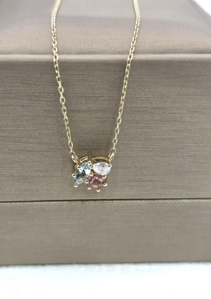 Mehrstein-Halskette handgefertigt mit blauem Topas, Turmalin und Diamant in massivem Gold und Silber. Besonderes Geschenk für sie.