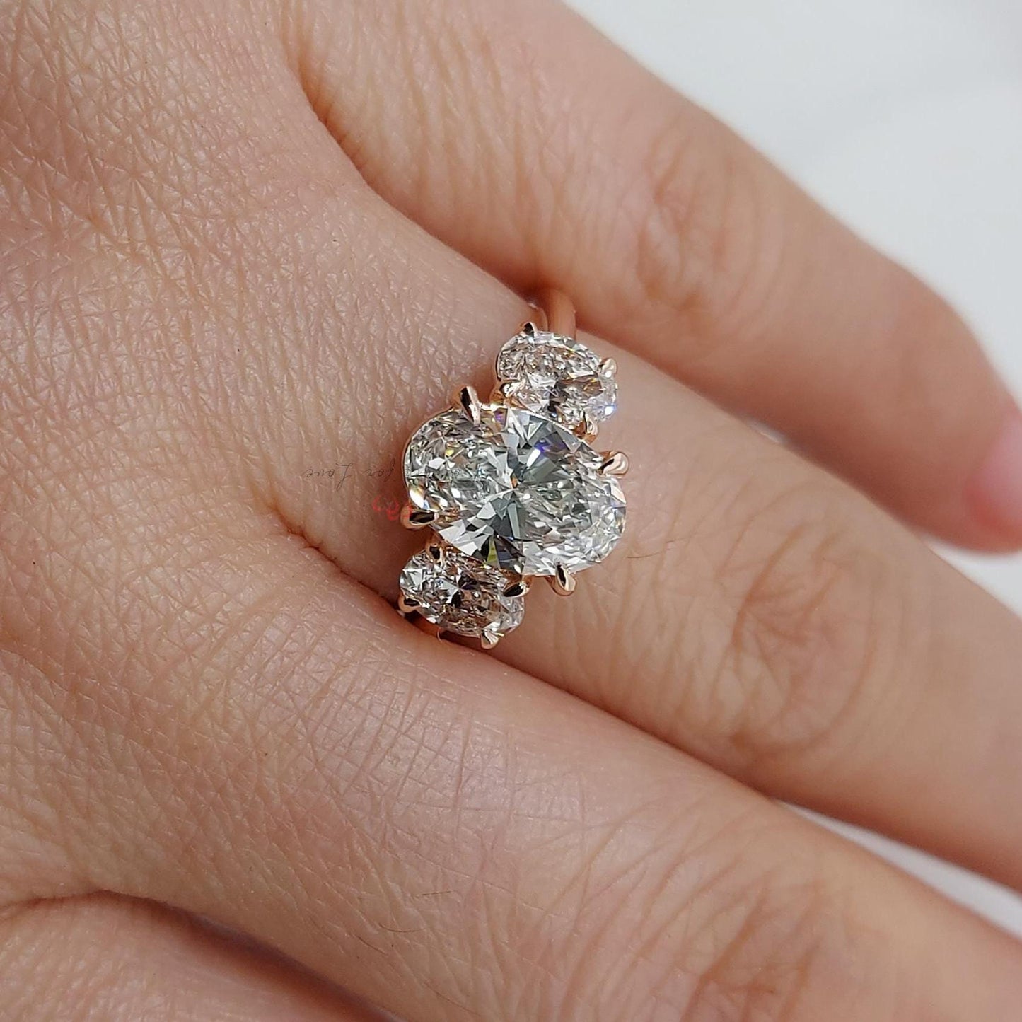 3 Ct Oval Diamond Three Stone Engagement Ring — E VVS2 Oval cut Moissanite engagement ring in Gold or Platinum — custom handcrafted by Forever For Love