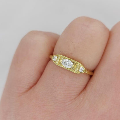 Oval Diamond Three Stone Engagement Ring
