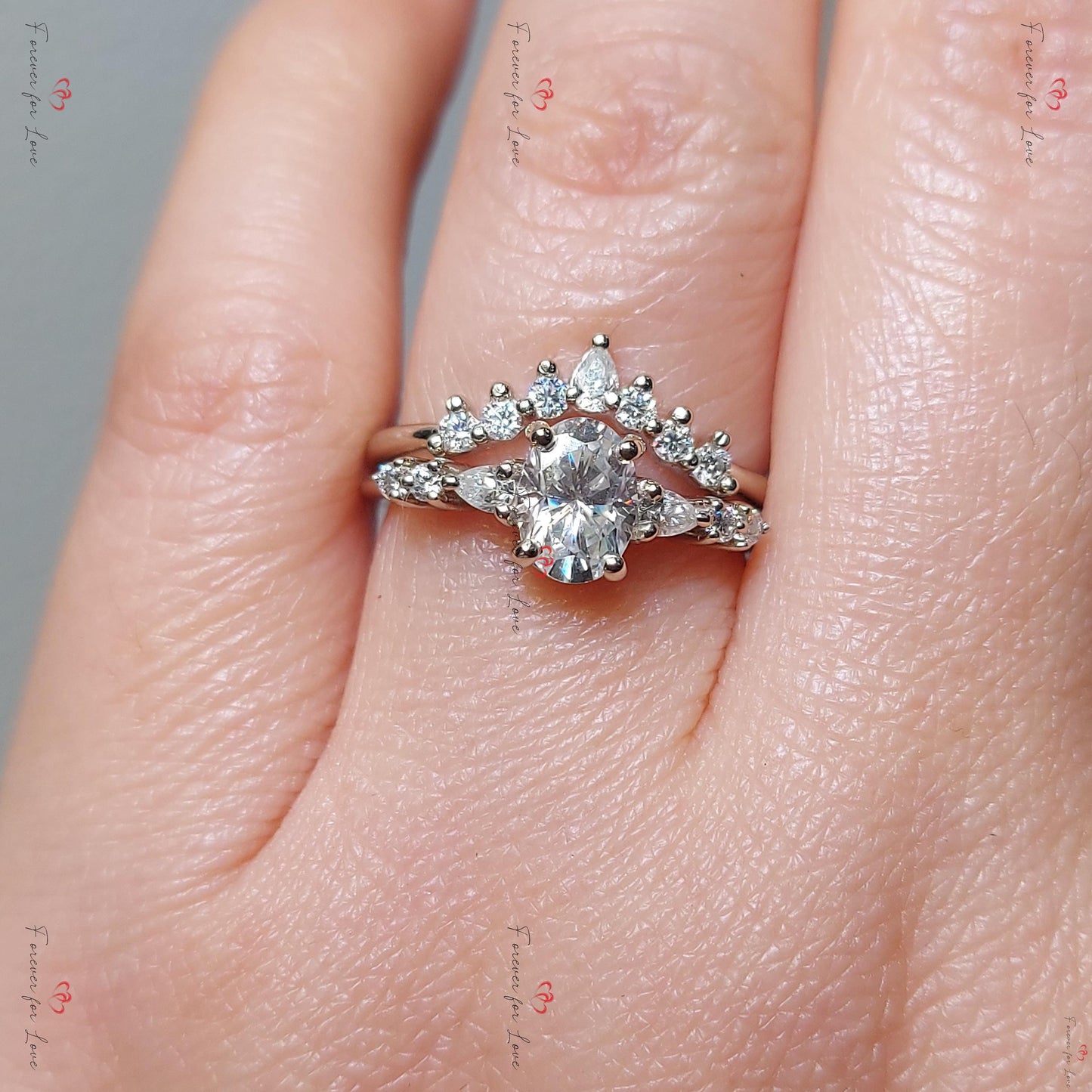 Parure de mariage délicate en moissanite ovale avec bague empilable Oval cut Moissanite taille brillant engagement ring in Gold or Platinum — custom handcrafted by Forever For Love