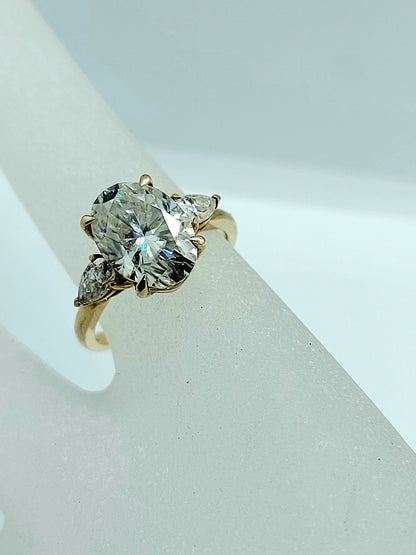 Oval Moissanite Three Stone Engagement Ring