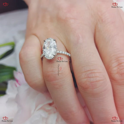 Bague de fiançailles en moissanite ovale avec halo caché et glace pilée