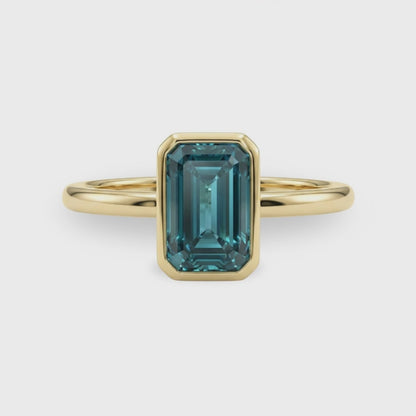 1Ct Fancy Vivid Blue Emerald Cut Bezel Set Lab Grown Diamond Ring