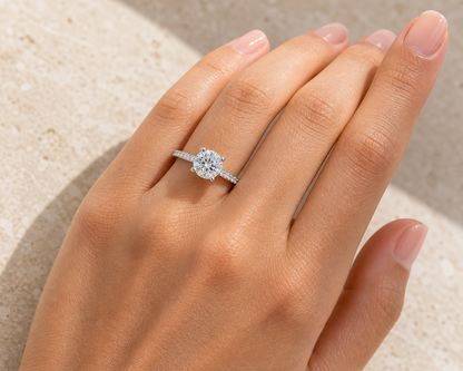 Model wearing the 6.5mm round brilliant hidden halo engagement ring
